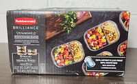 Photo of box packaging showing Rubbermaid Brilliance Stainshield 10-Piece Set with product information and food images on the front.