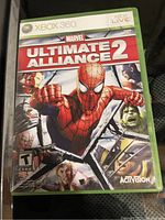 Front cover of the Xbox 360 video game Marvel Ultimate Alliance 2 showing the game title and various Marvel comic characters.