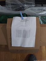 Instruction sheet showing 10' x 12' frame gazebo line drawing and style number