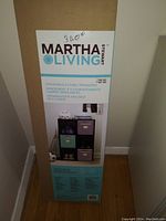 Photo of the retail box showing Martha Stewart Living brand and details about the stackable cube organizer with 6 cubes.
