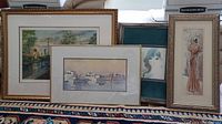 Four framed art pieces, including watercolor of boats and prints depicting a pond scene, a woman in vintage fashion, and a girl