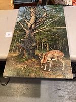 Full front view of painting showing pine tree and deer in forest clearing