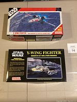 Two Star Wars model kits, FineMolds 1:48 scale X-Wing and Y-Wing Fighters, in original unopened boxes showing box art and labeling.