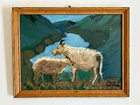 Frontal photo of the original oil painting showing the two goats in mountainous landscape with river, signed and dated by artist.
