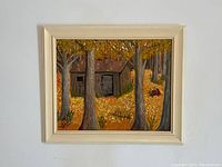 Framed original oil painting showing a rustic wooden shack and autumn forest scene.