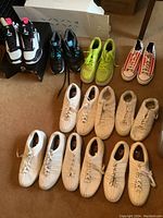 Overview of all shoes arranged on floor