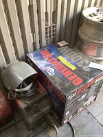 UST generator box, 2300W label visible, stacked next to welder