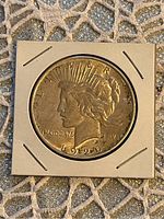 Obverse side of the 1926 American Peace Silver Dollar showing Liberty's profile and date.