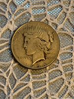 Obverse image of the 1934 American Peace Silver Dollar showing the Lady Liberty profile and date.