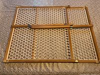 Full view of Safety 1st wooden safety gate showing vented panel and frame