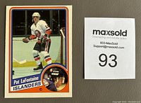 Front of 1984-85 OPC Pat Lafontaine rookie hockey card showing player in Islanders uniform with sharp corners and original gloss.