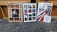 Three musical DVDs displayed side by side: AC/DC 'No Bull', Bon Jovi 'Live', and The Who 'At Kilburn 1977'.