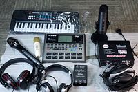 Wide overhead view of all included audio equipment on floor