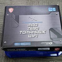 Box of MSI MAG Z690 Tomahawk WIFI motherboard showing model and brand details.