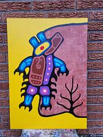 Full view of painting against brick wall