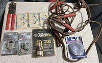 Image of miscellaneous automotive and electrical items on a table