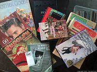 Photo showing all 10 items including children's books, Life magazine, and Eaton's catalogues in a group view