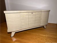 Front and side perspective of the cedar chest showing the design and wood finish.