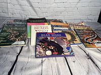 Photo showing multiple beading books and magazines laid flat with covers visible