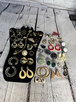 Top-down view of entire jewelry lot showing layout and variety of pieces