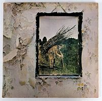 Front cover of the Led Zeppelin IV album jacket showing worn vintage artwork of a man carrying sticks.