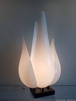 Front view of lamp illuminated in white