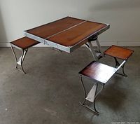 Folding travel picnic/tea table fully assembled with wooden top and seats extended