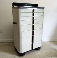 Front view of full cabinet showing drawer arrangement, chrome trim and paint finish