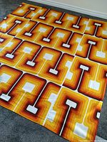 Full queen size sheet laid flat on floor showing retro geometric pattern