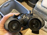 Photo showing the front objective lenses and Bushnell Ensign branding.