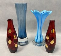 Four art glass vases: blue dimpled vase by Bo Borgstrom, two red bud vases with gold accents, and a 7-inch blue blown vase