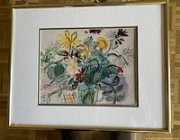 Frontal view of a small framed floral artwork showing a colorful variety of flowers in a glass vase with a gold frame.