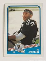 Front of 1988 Topps Bo Jackson rookie football card showing player portrait in Los Angeles Raiders uniform, card edges and corners appear clean and sharp.