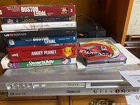 Front view of Pioneer Elite device with media stacked on top