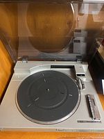 Full view of Sony PS-LX510 turntable with dust cover down showing platter and tonearm.