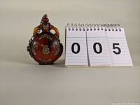 Full lot shot with number card for lot identification.