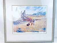 Full view of framed swift fox print artwork showing fox and scenic landscape with rock formations and mountains.