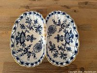 Top view of the double shell porcelain nut dish showing the blue floral pattern and gold gilt edges