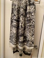 Full scarf hanging, showing overall pattern and dimensions.