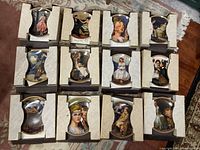 Photo showing all 12 Norman Rockwell Rediscovered Women plates in original protective packaging arranged on floor.