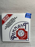 Front view of the sealed Pennant Pursuit Red Sox edition board game showing logo and branding.