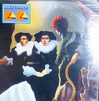 Close-up photo of the vintage Alice Cooper vinyl record album cover titled 'Dada' showing surreal artwork with figures and person, measuring about 12x12 inches.