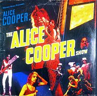 Front cover of the vinyl record album displaying theatrical band imagery and title 'The Alice Cooper Show'