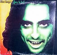 Front cover of the Alice Cooper 'Goes to Hell' vinyl record showing the facial artwork with green hue and some wear on the edges.