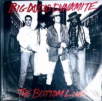 Front cover of the vinyl record showing the band members and title in red text.