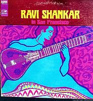 Front cover of the vinyl record featuring colorful artwork of Ravi Shankar playing the sitar with album title