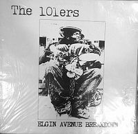 Front cover of the vintage vinyl record by The 101ers titled 'Elgin Avenue Breakdown' showing black and white photo and text with some surface wear.