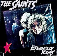 Front cover of the vinyl record 'Eternally Yours' by The Saints, showing the band members photo and some wear on the cover edges.