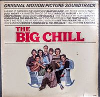 Front cover of The Big Chill soundtrack vinyl showing title, artists listed, and a group photo of eight people in casual attire. The cover shows some wear and discoloration.