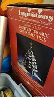 Box of Inspirations brand lighted ceramic Christmas tree model CTL-20 with product image on box.